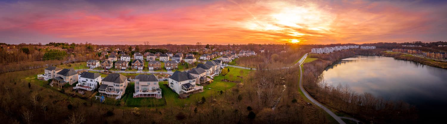 Aerial sunset panorama view of community with stunning infrastructure