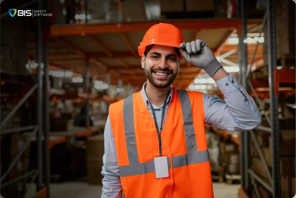 A Man with safety helmet and vest, during work hours on the job site