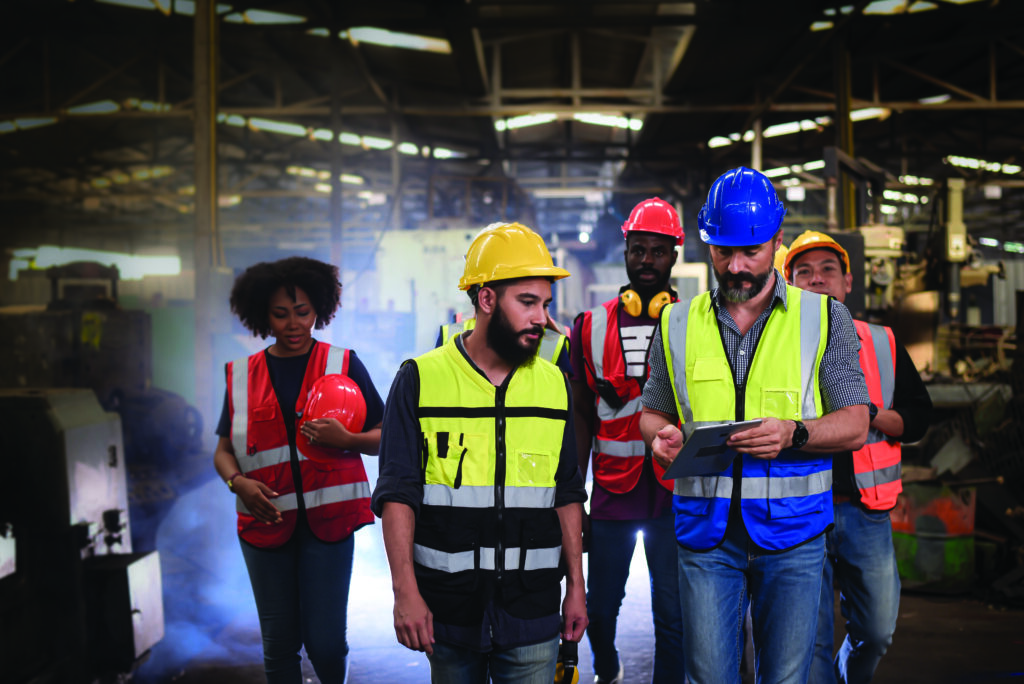 Team reviewing workplace safety analytics illustrating how EHS-LMS integration supports informed training decisions.