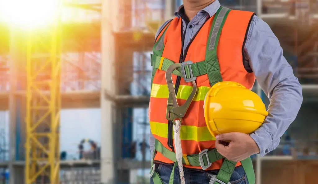 Worker in PPE symbolizing key features in modern onboarding software for safety-focused teams.