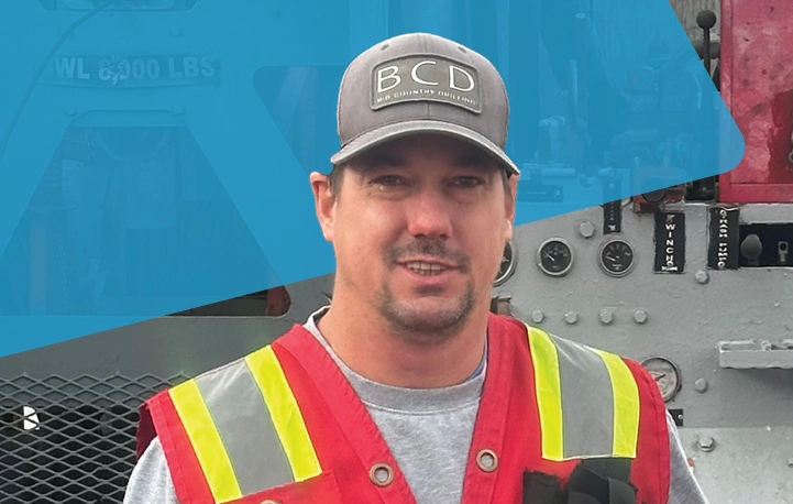 Close-up of Mark Leboldus in safety gear, representing field-based safety leadership and operational experience in drilling environments.